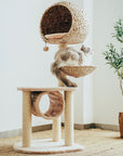 Right side of the Bird Nest Cat Tree with a cat looking into the distance from the platform